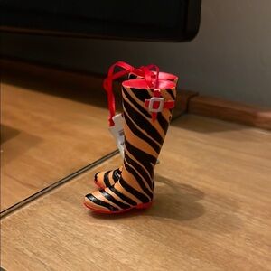 Orange and Black Heeled Boots with Zebra-Like Pattern